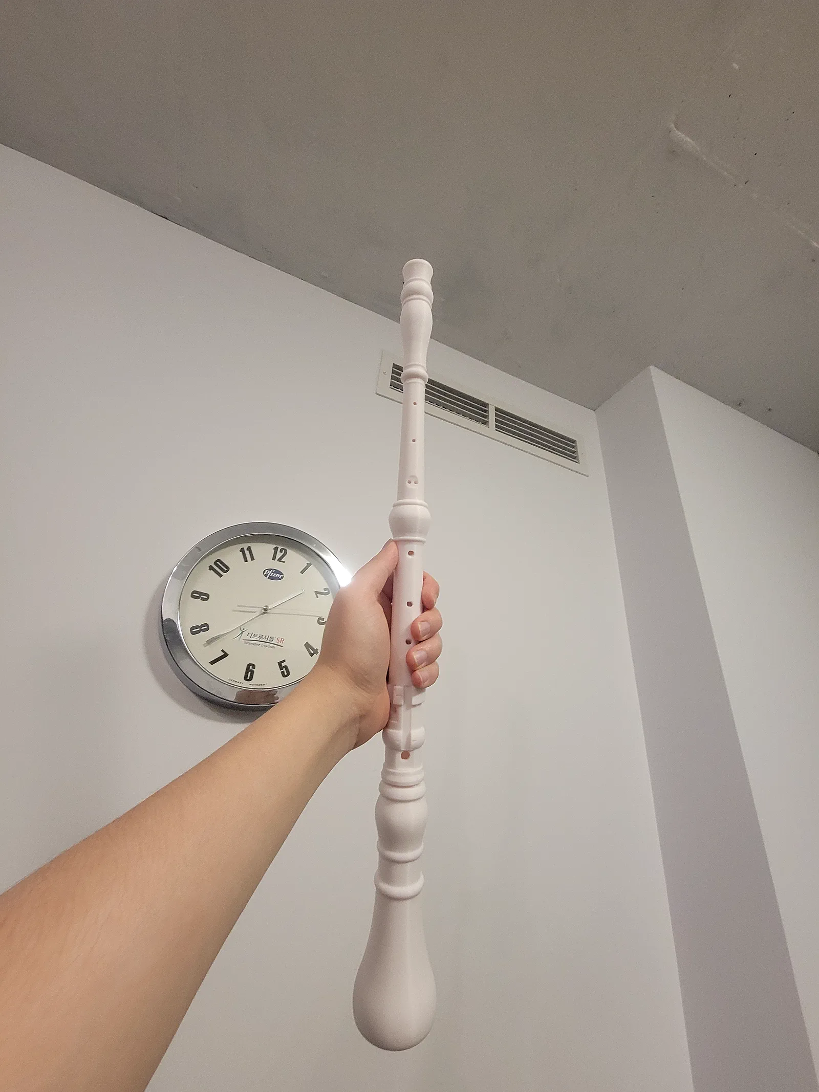Holding a finished 3D-printed recorder